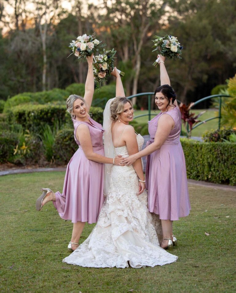 bridal party throwing bouquet